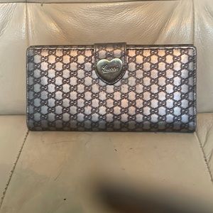 Gucci heart wallet.